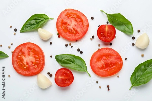 Fototapeta Composition with fresh vegetables, herbs and spices on white background