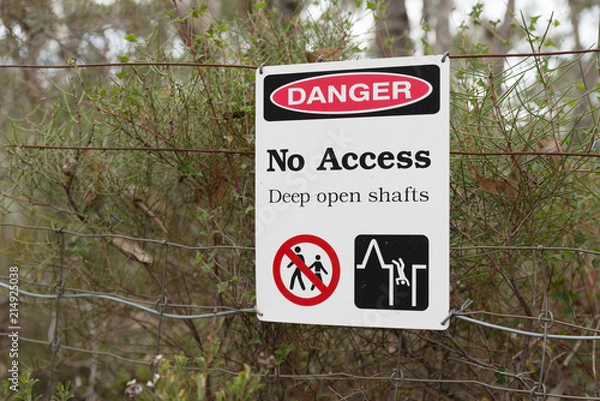 Obraz Danger No Access Deep open Shafts safety warning sign in front of closed gold mine Jupiter Diggings in Adelaide Hills South Australia