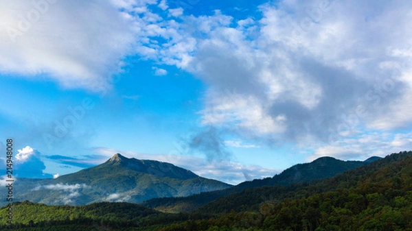 Obraz Beautiful green mountain peak landscape on a blue sky with some clouds