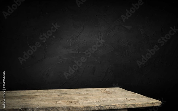 Fototapeta black background and desk board table