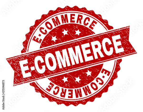 Fototapeta E-COMMERCE seal stamp with corroded texture. Rubber seal imitation has circle medallion shape and contains ribbon. Red vector rubber print of E-COMMERCE title with dirty texture.