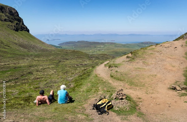 Fototapeta Old Couple Enjoying the View of  Quiraing Trail in Summer Skye Scotland UK