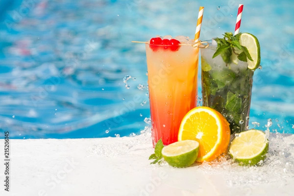 Obraz Tropical cocktail on a pool background