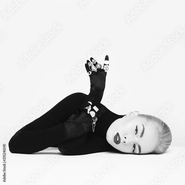Fototapeta Beautiful blonde lady with lot of precious rings
