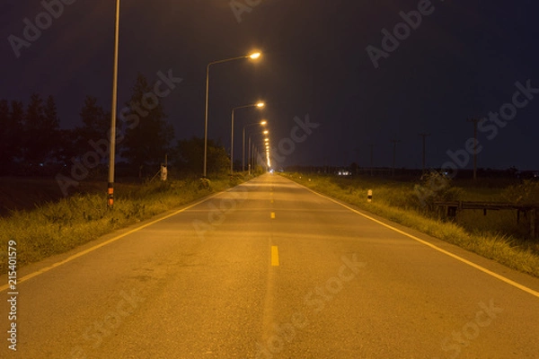 Obraz 夜・オレンジ・光・道路・田舎