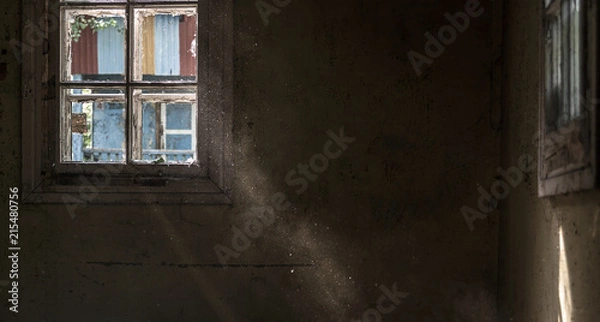 Obraz rays of the sun through an old window