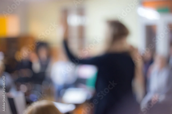 Fototapeta Blurred shots of the person conducting the choir
