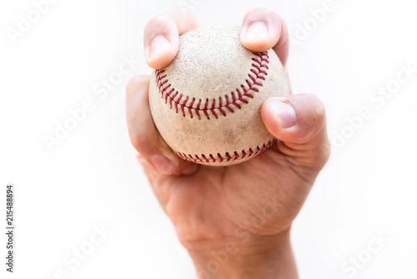Obraz Two seam fastball grip - close up on a white background with copy space.
