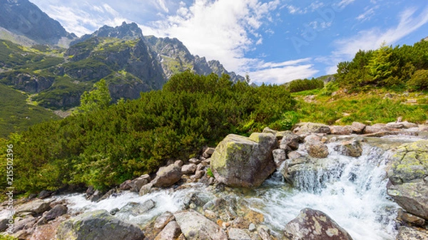 Fototapeta Majestic mountains landscape under morning sky with clouds. High Tatra mountain summer landscape