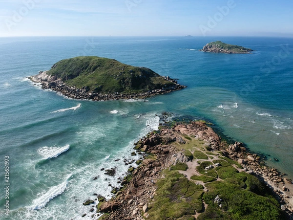 Fototapeta  Aerial view of green islands on Brazilian beach with white sand and blue sea.