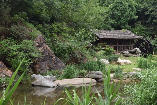 Obraz Quaint Cottage next to River
