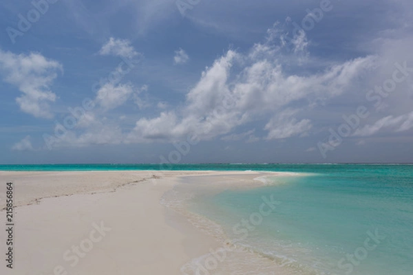 Fototapeta Lonely beach in the Caribbean on a sunny summer day with an almost cloudless sky No. 2