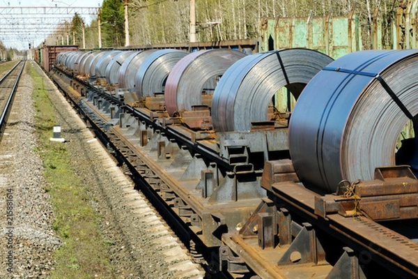 Fototapeta Sheet metal is loaded into railway cars