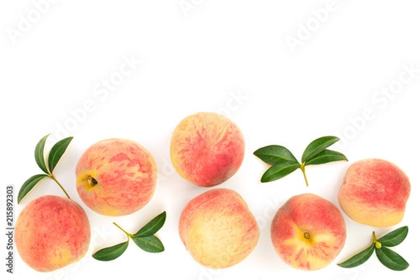 Fototapeta ripe peaches with leaves isolated on white background with copy space for your text. Top view. Flat lay pattern