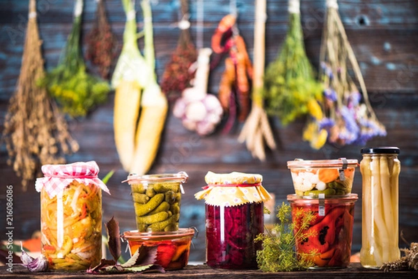 Obraz Pickled Marinated Fermented vegetables on shelves