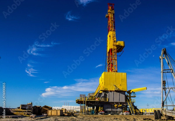 Obraz drilling rig on land yellow