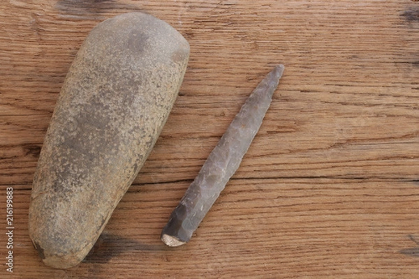 Obraz stone age tool, ax head and arrowhead