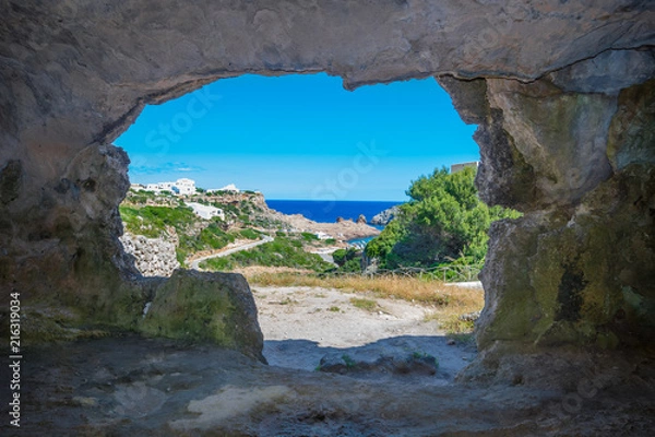 Fototapeta View From the Inside of Cala Morell Necropolis Caves