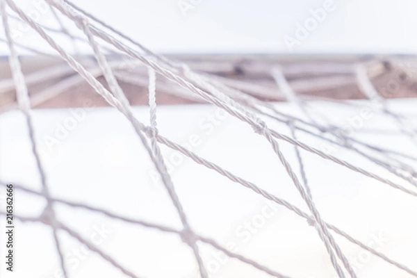 Obraz Close up front view photo from a goal net in a soccer court 