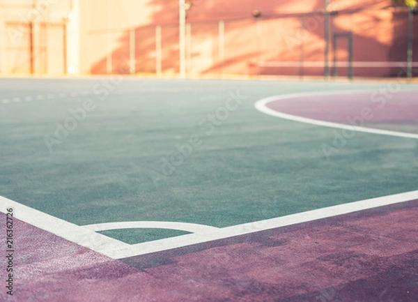 Obraz It's front view and low angle of a sports court in the sunset. A place to have a fun, competitions, recreations and play sports