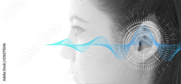 Fototapeta Hearing test showing ear of young woman with sound waves simulation technology