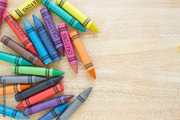 Fototapeta crayons drawing border multicolored on wooden background