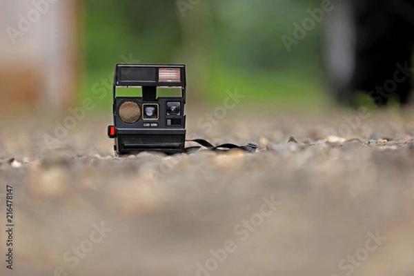 Fototapeta old camera on ground