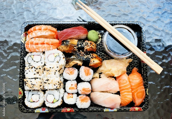 Fototapeta tray with sushi assortment