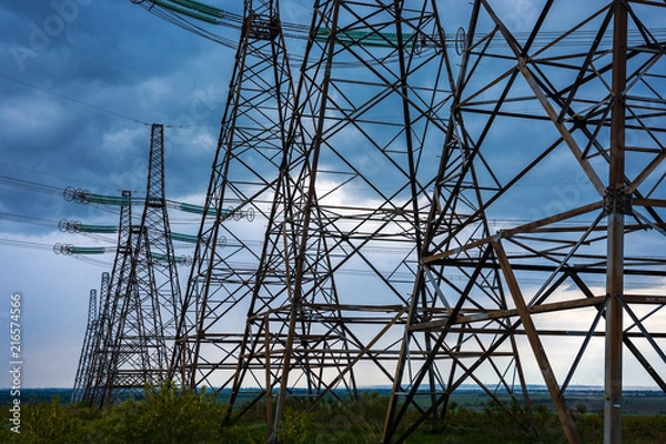 Obraz  high-voltage  power lines at storm clouds.
