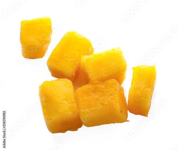 Obraz Mango fruit with mango cubes and slices.