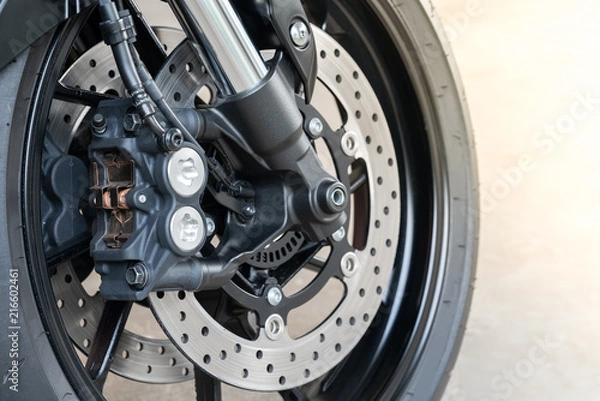 Obraz Close up of radial mount caliper on big bike, Motorcycle with Twin Floating Disk Brake and ABS system on a Sport Bike with copy space.