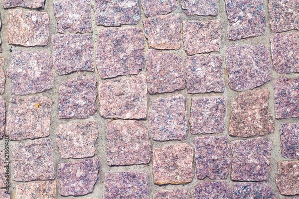 Fototapeta fragment of granite pavers in different color schemes