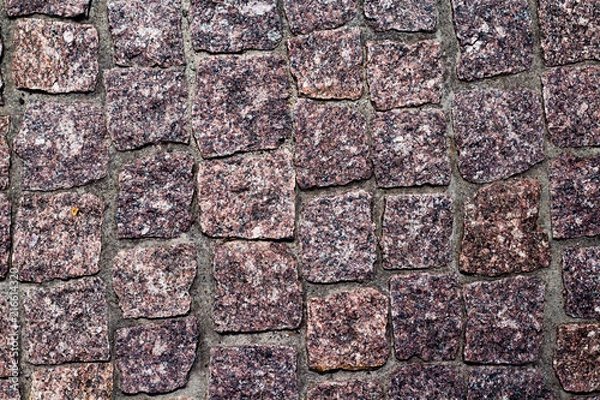 Fototapeta fragment of granite pavers in different color schemes