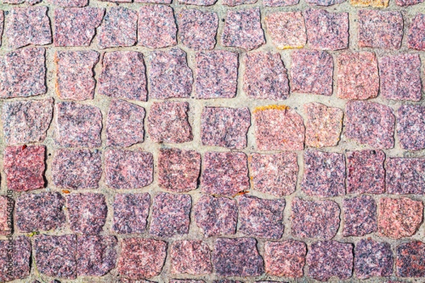 Fototapeta fragment of granite pavers in different color schemes