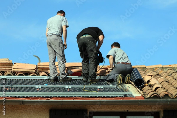 Obraz Travail d'équipe sur le toit
