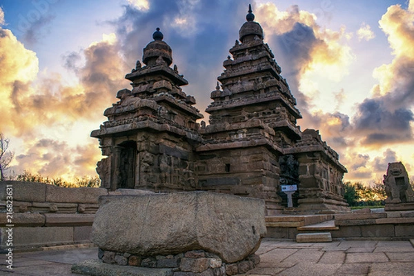 Fototapeta Photo shot on sunrise time where the historical buildings of Mamallapuram monuments are highlighted. 
