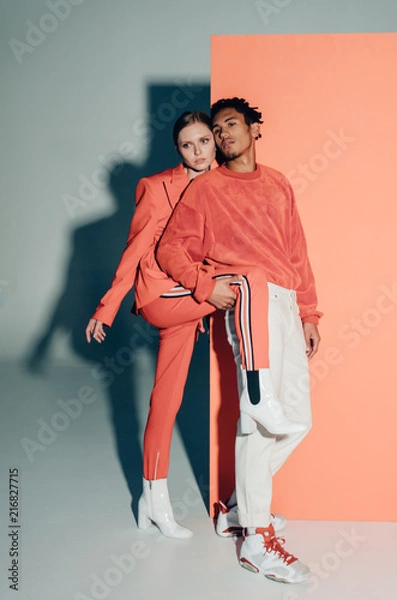 Fototapeta Casual couple in red