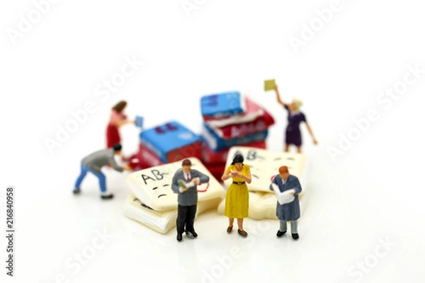 Fototapeta Miniature people : reading a book using as background education or business concept.