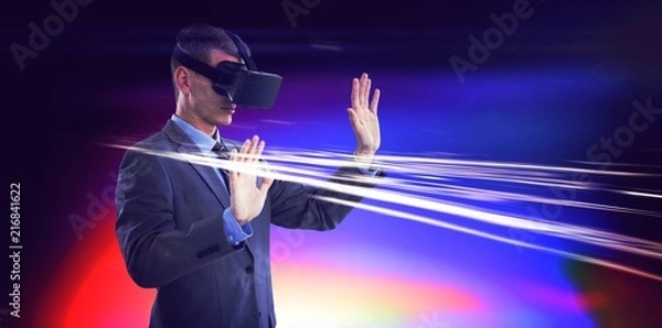 Fototapeta Businessman using virtual reality headset