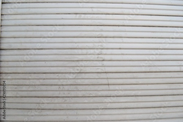 Obraz Closeup photograph of white, grungy window blinds.