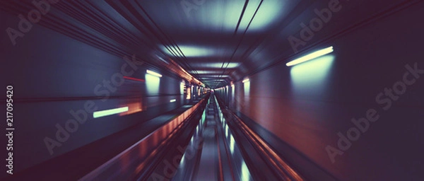 Obraz Through the subway tunnel, abstract motion blur lighting.