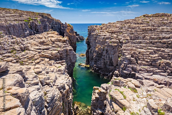 Fototapeta Rock formations on the cliffs of the island of San Pietro in Sardinia, Italy.