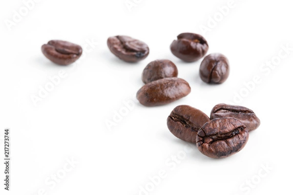 Obraz Roasted coffee beans isolated on pure white background for content using.