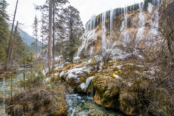 Obraz Waterfall from a cliff in the forest