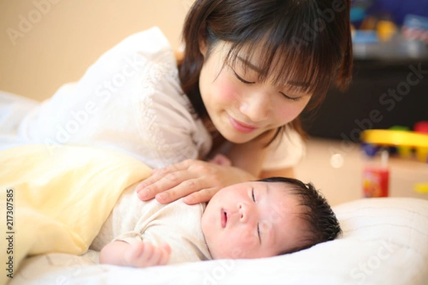 Fototapeta 新生児と母親