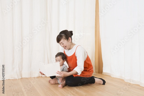 Obraz 保育士と赤ちゃん