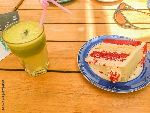 Obraz Green smoothie with pie on a table