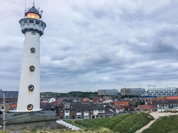 Obraz Lighthouse with city view Egmond