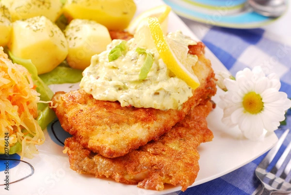 Fototapeta breaded fish for dinner