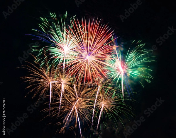 Fototapeta Abstract colored firework background used for overlay new year festiva